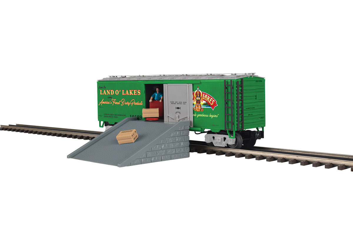 MTH 20-94963 O Scale Premier Land O' Lakes Operating Reefer Car with door open and workman unloading
