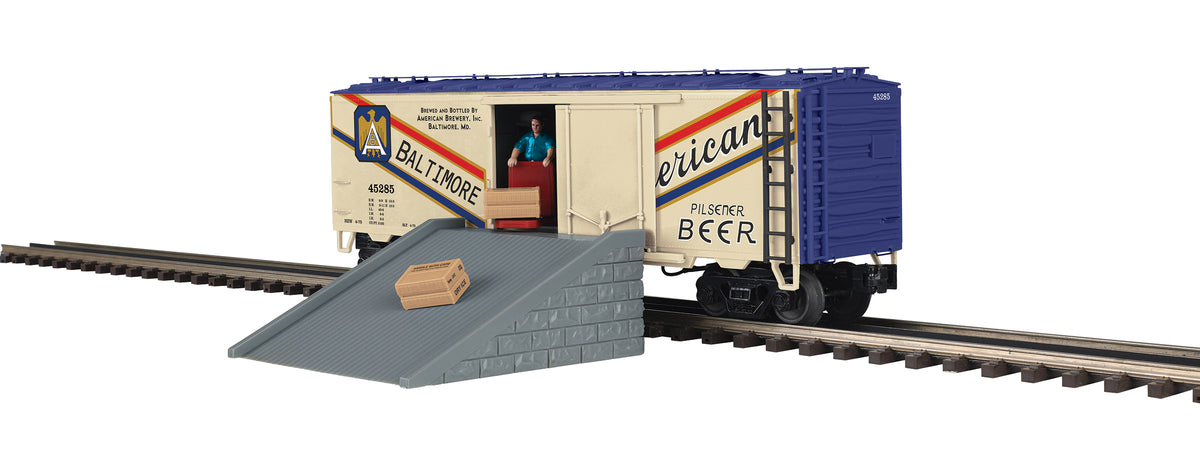 MTH 20-94964 O Scale Premier American Pilsner Operating Reefer Car with door open and workman unloading