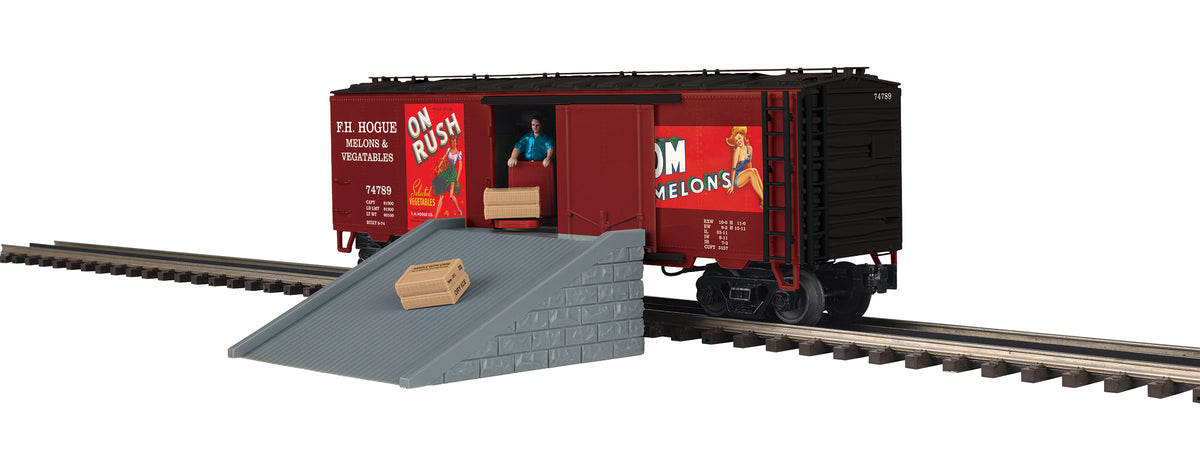 MTH 20-94965 O Scale Premier F.H. Hogue Melons & Vegetables Operating Reefer Car with door open and workman unloading
